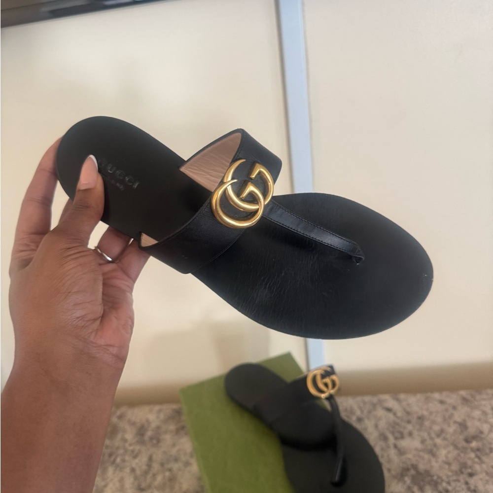 Gucci Black and Gold Sandals with Elegant Design